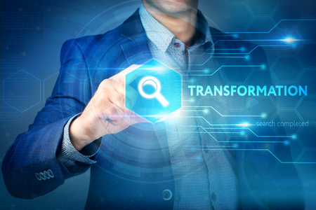 Business, internet, technology concept.
Businessman chooses Transformation button on a touch screen interface.の写真素材