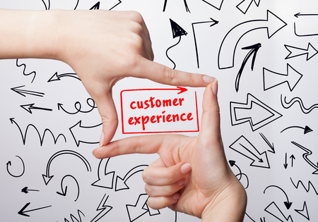 Technology, internet, business and marketing. Young business woman writing word: customer experienceの写真素材