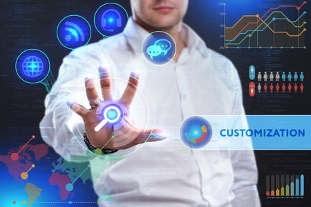 Business, Technology, Internet and network concept. Business man working on the tablet of the future, select on the virtual display: Customizationの写真素材