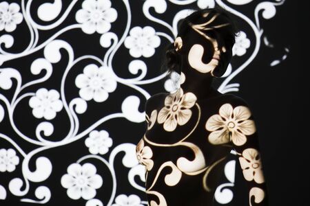 Fashion portrait of young elegant woman. Colored background, studio shotの写真素材