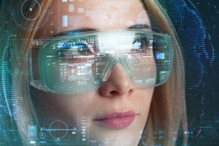 Business, Technology, Internet and network concept.A young girl works in virtual glasses. Technology...