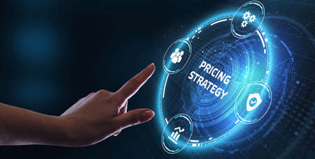 Business, Technology, Internet and network concept. Young businessman shows the word on the virtual display of the future: Pricing strategyの写真素材