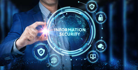 Cyber security data protection business technology privacy concept. Young businessman select the icon Information security on the virtual display.の写真素材