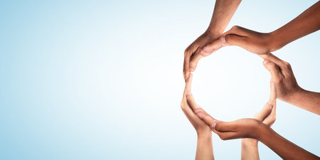 Symbol and shape of circle created from hands.The concept of unity, cooperation, partnership, teamwork and charity. diversity of a diverse group of people connected together as a supportive symbol.の写真素材