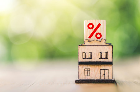 Mortgage rates business concept of investment housing real estate interest rates 3d home appraisal. planning savings money of coins to buy a home concept for property ladder, mortgage, real estate.の写真素材