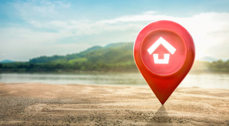 House symbol with location pin icon on empty dry cracked swamp reclamation soil in real estate sale...