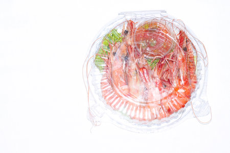Prawns in white background on plastic bowl.. Select focus.の写真素材