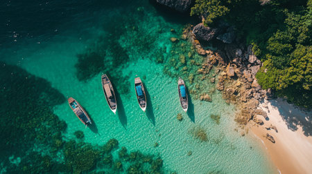 Boats anchored in the clear waters of Mu Ko Surin National Park.の素材