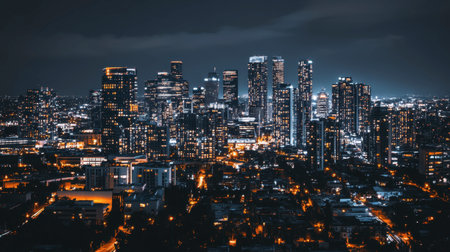 A stunning nighttime view of a vibrant city skyline, illuminated by countless lights. This urban scene captures the essence of metropolitan life with soaring buildings and a lively atmosphere.の素材