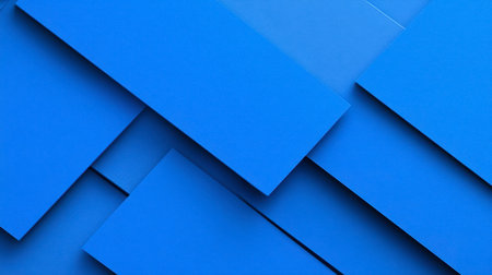 This image features an eye-catching arrangement of vibrant blue geometric shapes creating a modern and stylish background, perfect for creative projects.の素材