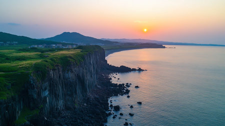 The stunning coastal view from the cliff at Seogwipo in Jeju, known for its breathtaking sunsets.の素材