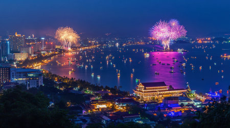 The vibrant Pattaya International Fireworks Festival, lighting up the night sky over the bay.の素材