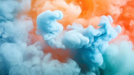 Vibrant smoke swirls in dynamic orange and blue, creating an abstract and artistic backdrop. Ideal for creative projects and design concepts.の素材