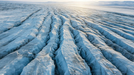 A breathtaking view of a frozen landscape showcasing intricate ice ridges and textures under soft sunlight, symbolizing nature's beauty and resilience.の素材