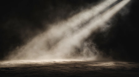 A breathtaking scene with ethereal light rays breaking through a misty atmosphere, creating a dramatic and serene ambiance in a dark space.の素材
