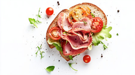 This vibrant open-faced sandwich showcases layers of sliced meats, fresh greens, and juicy cherry tomatoes, artfully arranged on toasted bread, ideal for a healthy meal.の素材