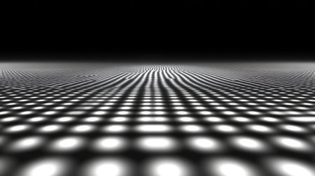 A striking abstract image showcasing a patterned interplay of black and white dots arranged on a smooth surface, creating a sense of depth and perspective.の素材