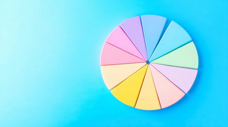 A visually appealing pie chart made of pastel colors against a soft blue background, perfect for educational materials, presentations, and creative projects.の素材
