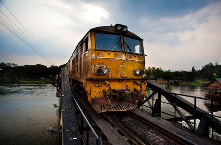 Old train running on steel bridge
