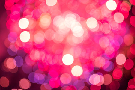 Pink bokeh glitter defocused lights abstract backgroundの写真素材