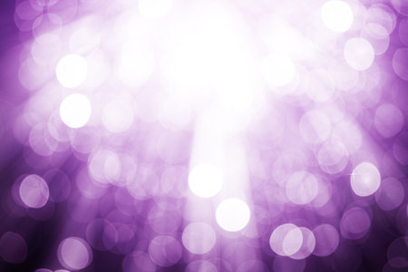 Purple ray lights bokeh glitter defocused abstract backgroundの写真素材