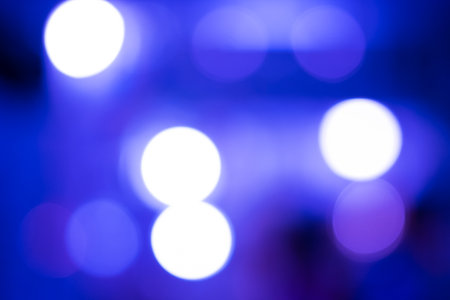 Blue bokeh defocused lights abstract backgroundの写真素材