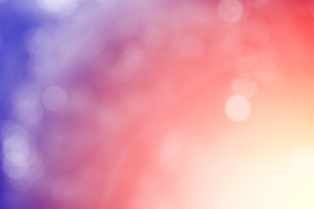 Red and purple glitter sparkle defocused rays lights bokeh abstract background.の写真素材