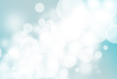 Blue glitter sparkle defocused rays lights bokeh abstract background.の写真素材