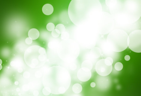 Green glitter sparkle defocused rays lights bokeh abstract background.の写真素材