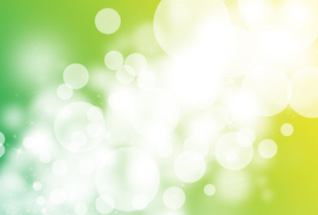 Green glitter sparkle defocused rays lights bokeh abstract background.の写真素材