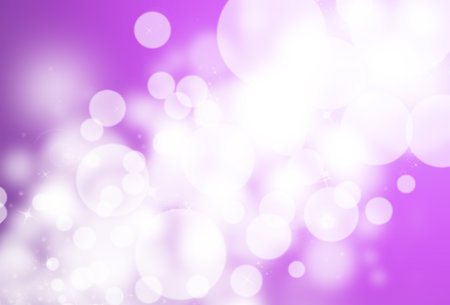 Purple glitter sparkle defocused rays lights bokeh abstract background.の写真素材