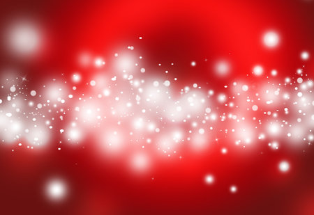 Red glitter sparkles defocused rays lights bokeh abstract christmas background.の写真素材