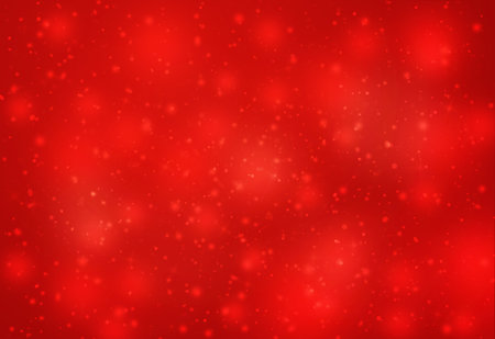 Red glitter sparkles defocused rays lights bokeh abstract chistmas background.の写真素材