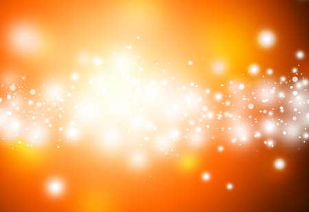 Gold glitter sparkles defocused rays lights bokeh abstract chistmas background.の写真素材
