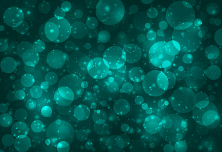 Green glitter sparkles defocused rays lights bokeh abstract background.の写真素材