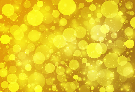 Gold glitter sparkles defocused rays lights bokeh abstract background.の写真素材
