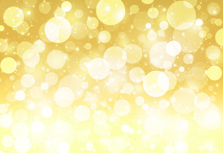 Gold glitter sparkles defocused rays lights bokeh abstract background.の写真素材