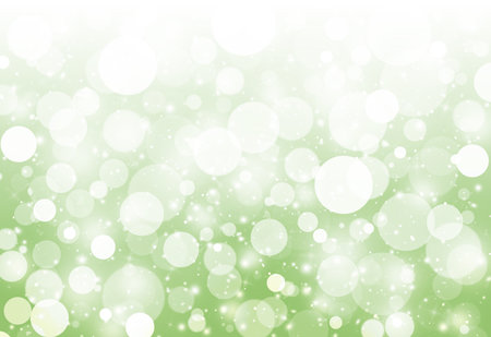 soft Green glitter sparkles defocused rays lights bokeh abstract background.の写真素材