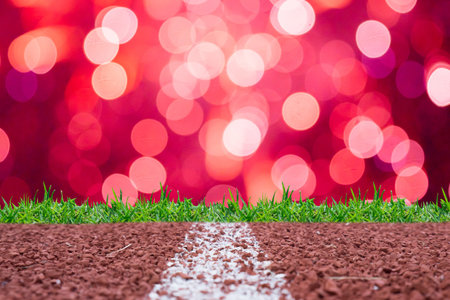 Running track with pink glitter rays lights bokeh business background.