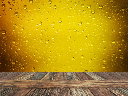 Empty wooden table and grass with gold water drop nature background. Product display template.の写真素材