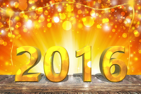 2016 new year on wooden table  with gold glitter sparkle defocused rays lights bokeh abstract background.の写真素材