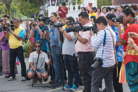AYUTTHAYA,THAILAND - DEC-18- 2015:Photographer on duty in public news take photo event for reporter...