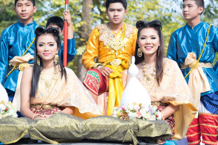AYUTTHAYA, THAILAND - DEC 18, 2015 :Festival Thai traditional parade,Beautiful girl and Handsome boy walk around in Ayutthaya city,december 18,2015 in Ayutthaya Province,Thailand.のeditorial素材