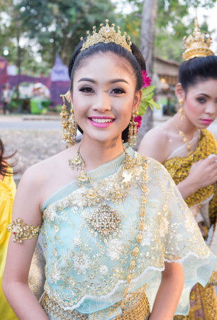 AYUTTHAYA, THAILAND - DEC 18, 2015 :Festival Thai traditional parade,Beautiful girl and Handsome boy walk around in Ayutthaya city,december 18,2015 in Ayutthaya Province,Thailand.のeditorial素材