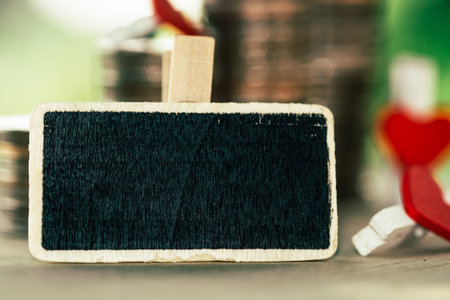 Empty sign and coins tower with nature background. business and saving money concept. Vintage or retro tone.の写真素材