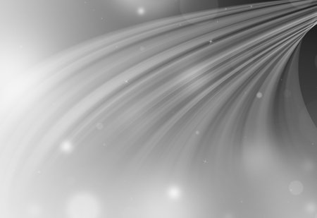 Gray glitter sparkle defocused rays down lights bokeh abstract holiday background.の写真素材