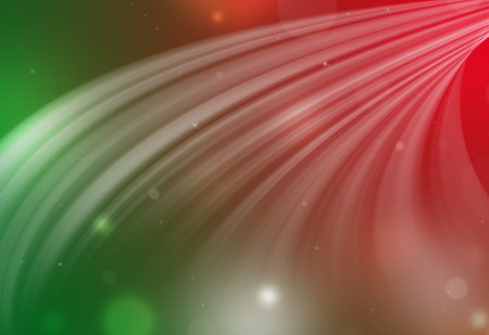 Red and green glitter sparkle defocused rays down lights bokeh abstract holiday background.の写真素材