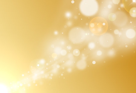 Gold glitter sparkle defocused radial rays lights bokeh beautiful abstract background.の写真素材