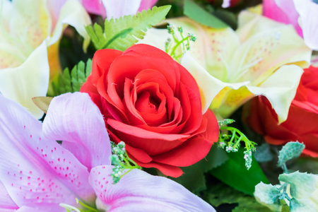 Close up red rose bunch of colorful beautiful flowers.の写真素材