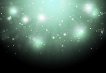 Soft green glitter sparkles defocused rays lights bokeh down abstract background/texture.の写真素材